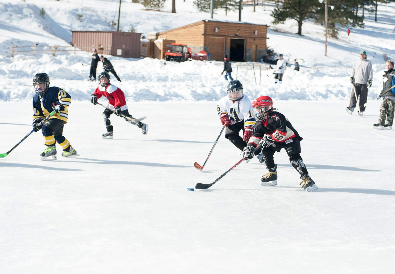 Young Aidan pond hockey
